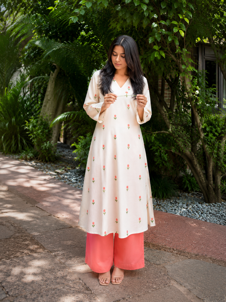 Women Floral Printed Kurta & Coral Palazzo Set (KPCREAMHEAT)