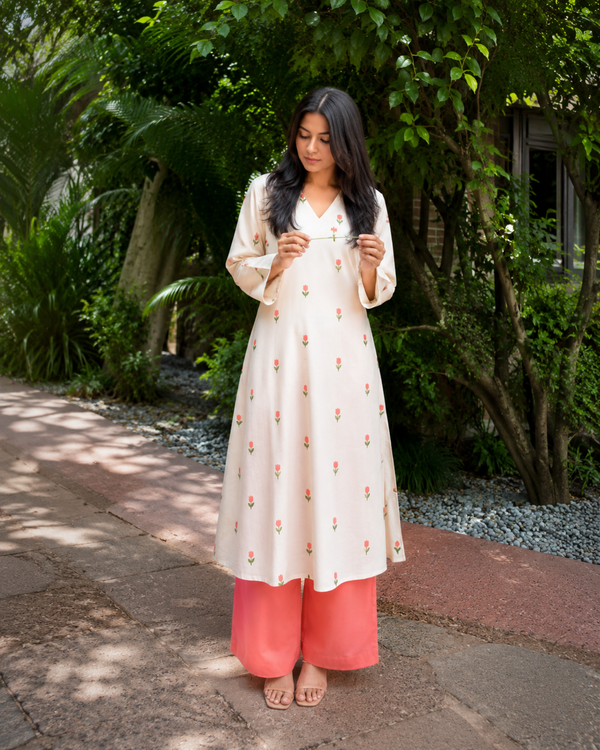 Women Floral Printed Kurta & Coral Palazzo Set (KPCREAMHEAT)