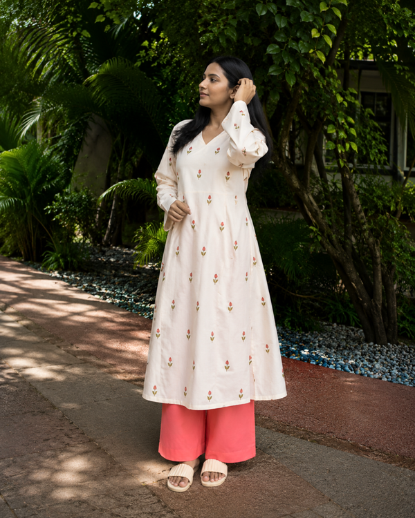 Women Floral Printed Kurta & Coral Palazzo Set (KPCREAMHEAT)