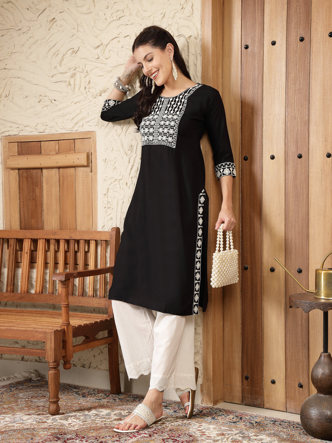 Stylum Women's Black Solid & Embroidered Rayon Straight Kurta (BLACKADAM)