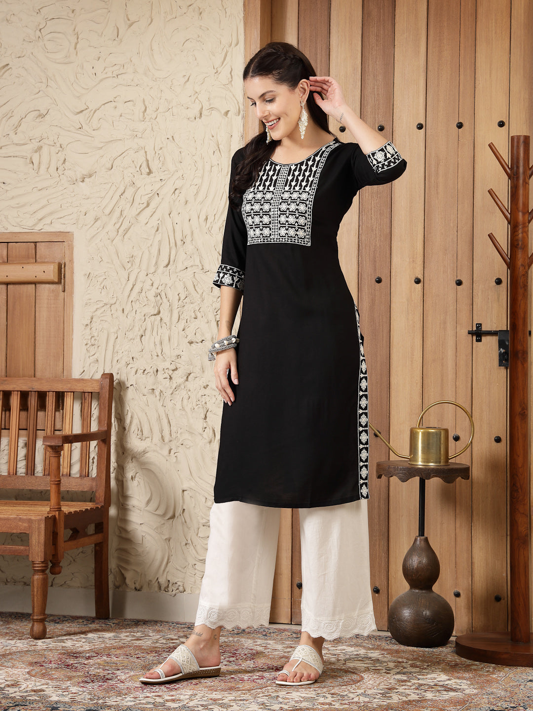 Stylum Women's Black Solid & Embroidered Rayon Straight Kurta (BLACKADAM)