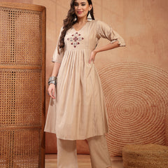 Stylum Women's Beige Solid & Embroidered Cotton A-Line Kurta Pant Set (KPBEIGETASHVI)