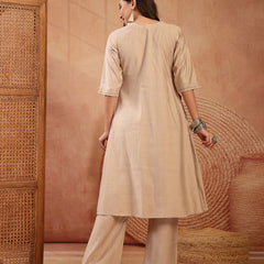 Stylum Women's Beige Solid & Embroidered Cotton A-Line Kurta Pant Set (KPBEIGETASHVI)