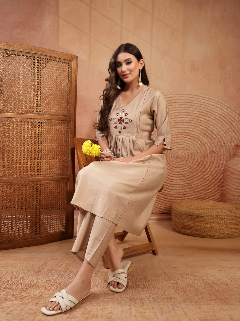 Stylum Women's Beige Solid & Embroidered Cotton A-Line Kurta Pant Set (KPBEIGETASHVI)