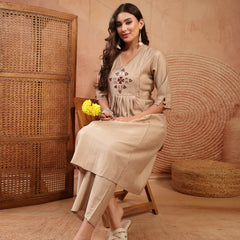 Stylum Women's Beige Solid & Embroidered Cotton A-Line Kurta Pant Set (KPBEIGETASHVI)