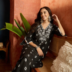 Stylum Women's Black Woven Design & Embroidered Cotton Straight Kurta Palazzo Set (KPBLACKTHANI)