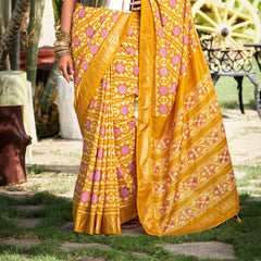 Stylum Women's Mustard Ikat Motifs Printed Foil Border Silk Saree (SRANURAMUSTARD)