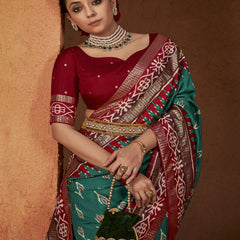 Stylum Women's Ikat Printed Zari Border Silk Saree (SRAROMAARAMAGREEN)