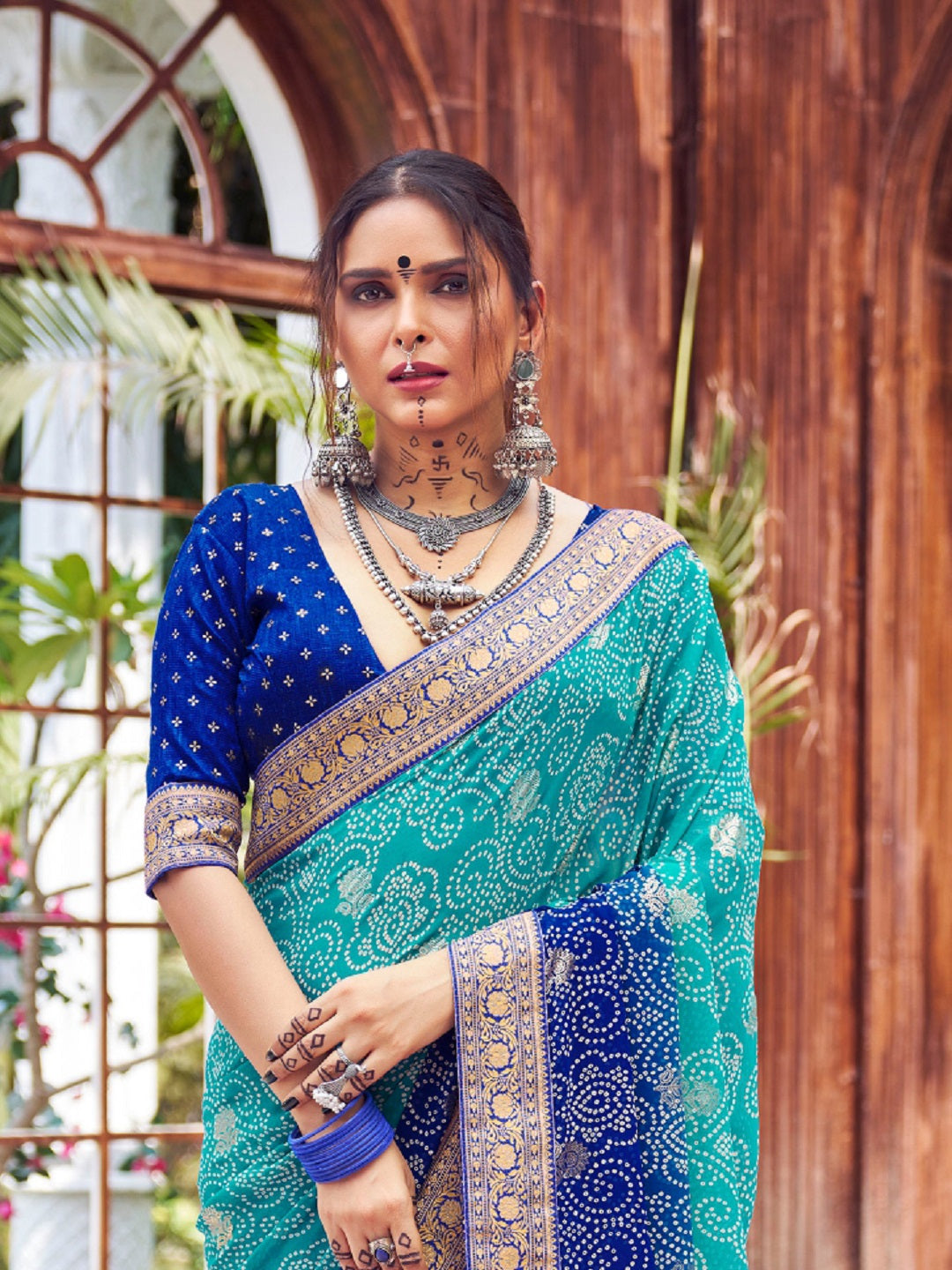 Stylum Women's Blue Bhandej Foil Print Georgette Saree (SRGHOOMARBLUE)