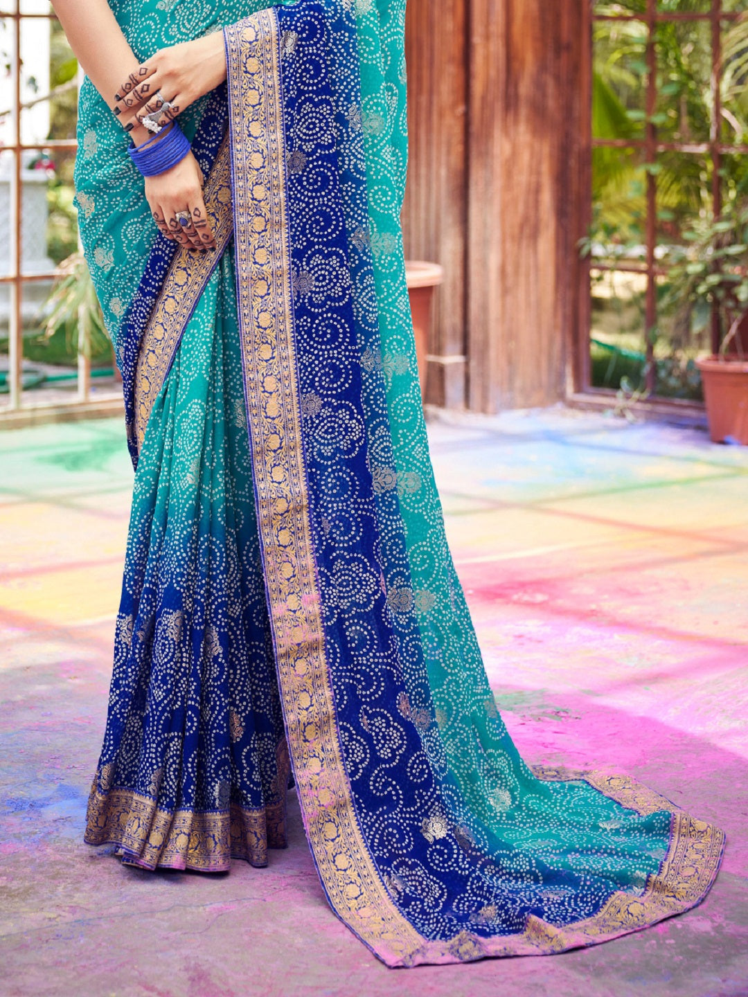 Stylum Women's Blue Bhandej Foil Print Georgette Saree (SRGHOOMARBLUE)